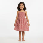 Brown dress with floral pattern on a white background