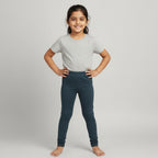Dark gray leggings on a light gray background